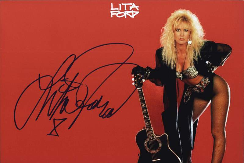 Lita Ford autographed poster. 