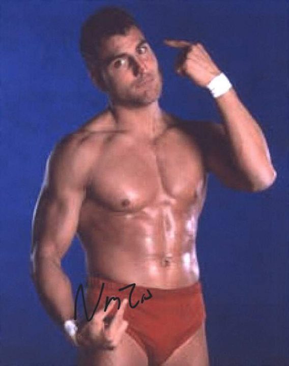 Nunzio authentic signed WWE wrestling 8x10 photo W/Cert Autographed 09 signed 8x10 photo