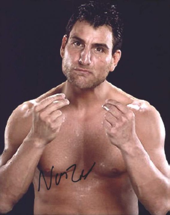 Nunzio authentic signed WWE wrestling 8x10 photo W/Cert Autographed 27 signed 8x10 photo
