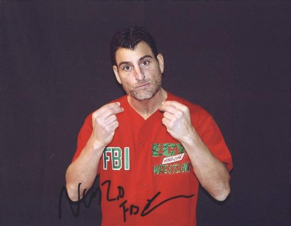 Nunzio authentic signed WWE wrestling 8x10 photo W/Cert Autographed 35 signed 8x10 photo
