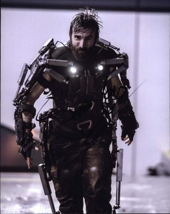 Sharlto Copley signed 8x10 poster