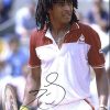 Tennis player Yannick Noah signed 8x10 photo