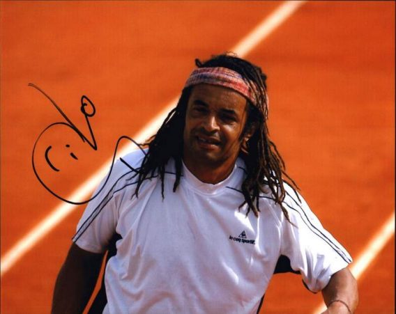 Tennis player Yannick Noah signed 8x10 photo